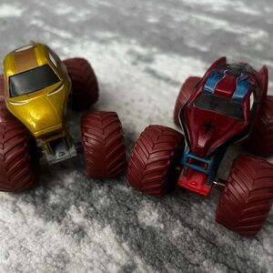 Iron Man & Spiderman Monster Jam Mudder Monster Trucks!